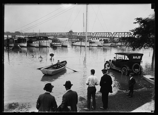 Members of the Cornithian Yacht Club were forced to use rowboats to reach their automobiles due to the rapid rise of the Potomac at Washington