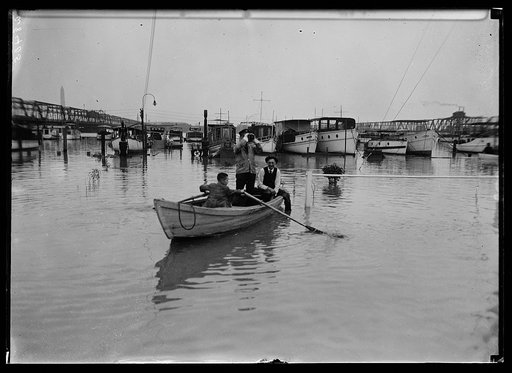 Members of the Cornithian Yacht Club were forced to use rowboats to reach their automobiles due to the rapid rise of the Potomac of Washington