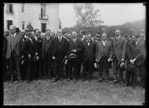 Prominent Latin-American Engineers now on a tour of U.S. at Pan-American Union where Secy. of State Hughes planted a tree in commemoration of the event. Other cabinet officers in group include Secy. Davis and Secy. Hoover