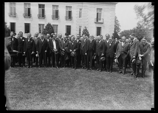 Prominent Latin-American Engineers now on a tour of U.S. at Pan-American Union where Secy. of State Hughes planted a tree in commemoration of the event. Other cabinet officers in group incl. Secy. Davis and Secy. Hoover