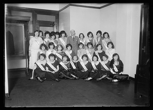 Every state is represented in this group of girls selected from the employees of U.S. Veterans Bureau, to assist Mrs. Coolidge at the garden party which she will give on June 5, for the disabled veterans from hospitals in and near Wash. Gen. Frank T. Hines, Director of the Bureau posed with the girl