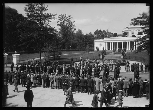 Veterans parading. Passing White House