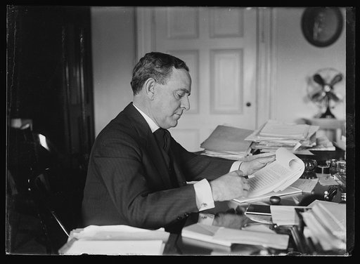 J. R. McCarl at desk in Treasury