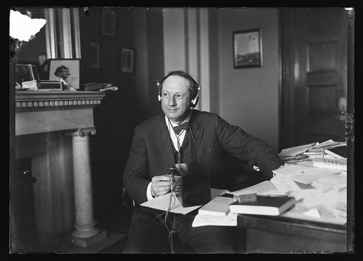 Democratic keynoter listens to the Republicans. Sen. Pat Harrison of Miss. at his office in the Senate Office bldg., the man who will make the keynote speech at the Democratic Convention, listening over the radio to the session of the Republican Conv. at Cleveland, June 12th