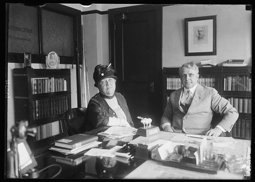 Mrs. H.T. Upton, prominent Rep. leader and Secy. Davis conferring on New Child Labor amendment
