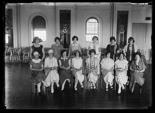 30 Wash. debutantes are rehearsing for a miniature revue to be given at Keith's Theatre, Wash., for the benefit of "Roxie's" radio fund for the soldiers. The revue will be known as "Keith's Summer Follies." Here are a few of the society girls rehearsing seated: left to rt.: Doris Wagner, Cecil Jones