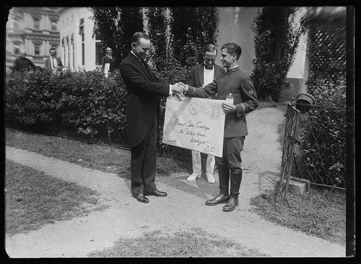 "Birthday greetings from 20,000 Mass citizens" is the message inscribed on the outside of a huge envelope and delivered July 4th to Pres. Coolidge by Louis Demontreux, Honor. Messenger of the Western Union from Boston [White House, Washington, D.C.