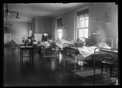 Walter Reed Hospital. Scene in one of the wards where the bed of every ill soldier is equipped with a set of radio earphones. This is the first hospital in the country to be completely equipped