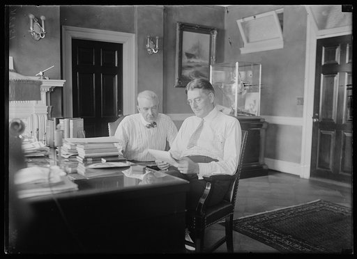 Curtis E. Wilbur, right