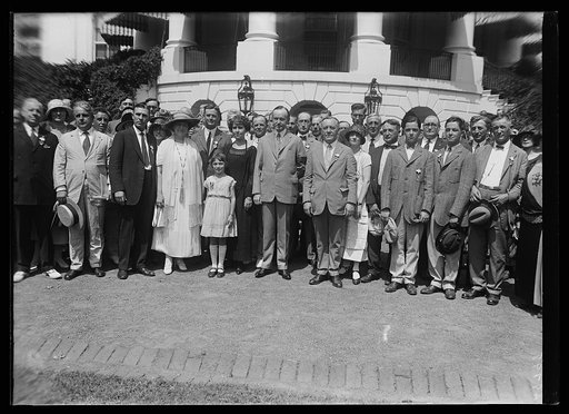President and Mrs. Coolidge and group outside White House, Washington, D.C.