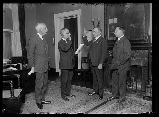 Group at swearing in; Andrew W. Mellon, left