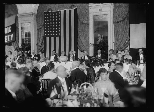 Group at dinner; includes John W. Weeks, near left, and Henry Cabot Lodge, Sr., center right
