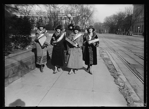 Group of women wearing sashes, probably suffragists or members of the National Woman's Party, in Washington, D.C.