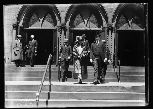 Mr. and Mrs. Coolidge leaving church