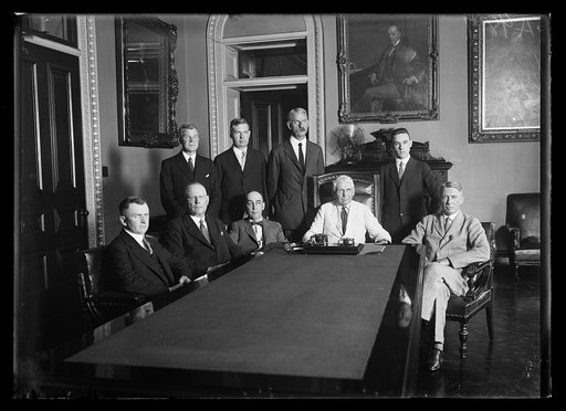 Group; Frank Kellogg at head of table