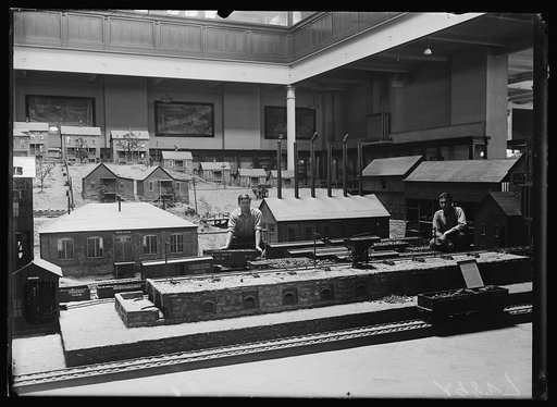 This miniature colliery and coke plant, in one of the unique exhibits in the Smithsonian Institution, is an exact reproduction of a large coal company in West Virginia. The model well illustrates the operations and setting, typical of the coal mining industry in general. It is said to be the largest