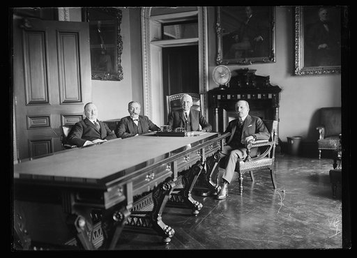 Group; Frank Kellogg at head of table