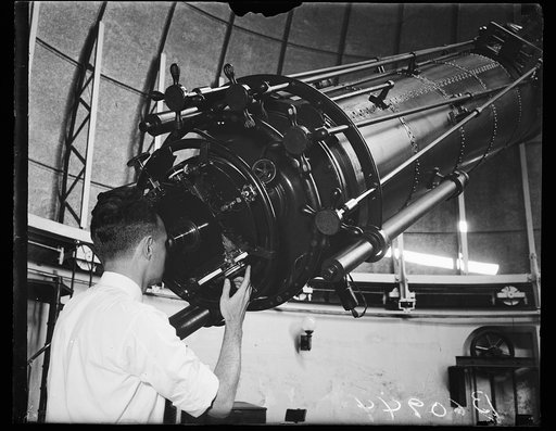 William Browner, Ast. Astronomer at the Naval Obs. looking thru 25 inch reflectuary teles.