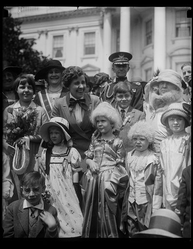 Grace Coolidge and children dressed in colonial clothing. White House, Washington, D.C.