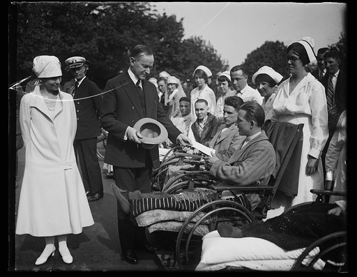 President and Mrs. Coolidge greeting wounded men