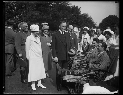 President and Mrs. Coolidge greeting wounded men