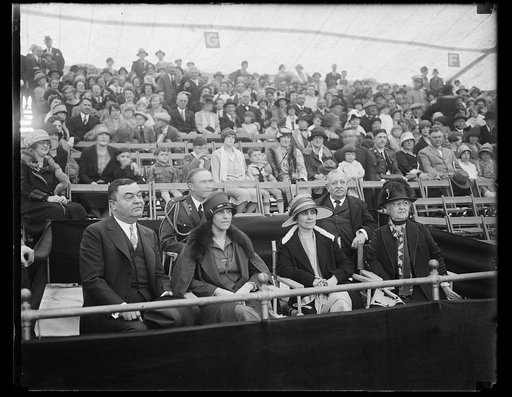 People in stands; Grace Coolidge third from right