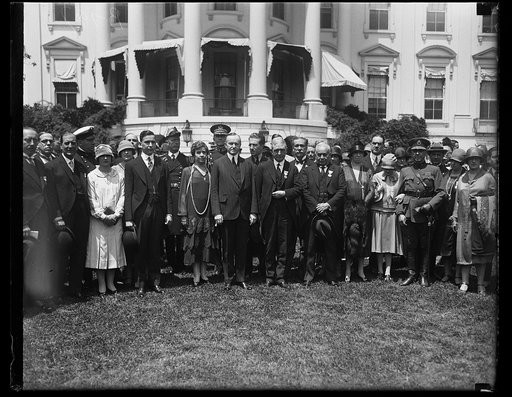 President and Mrs. Coolidge and group outside White House, Washington, D.C.