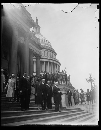 Group on Capitol steps; includes Nicholas Longworth at center