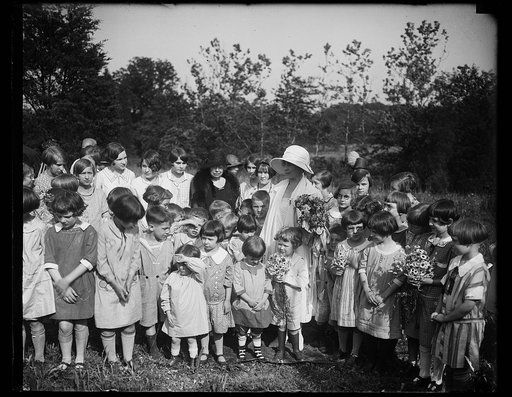Grace Coolidge and group of children outdoors