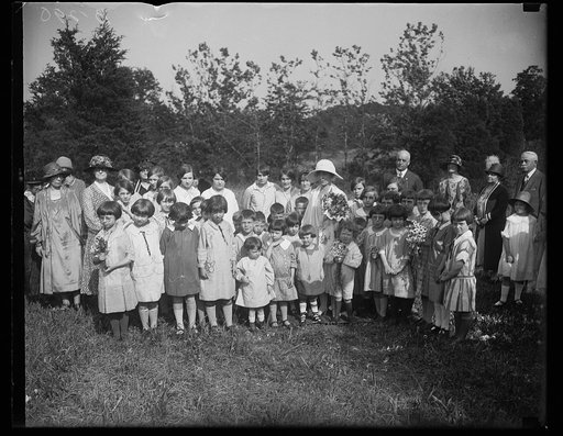 Grace Coolidge and group of children outdoors