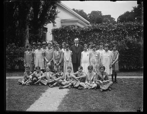 Calvin Coolidge with group of children outside White House, Washington, D.C.