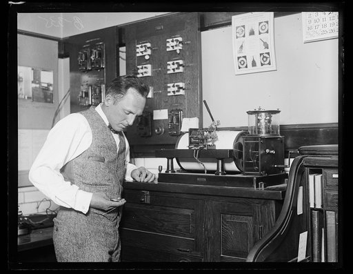 Here is your accurate timepiece. This photograph shows a chronograph -- an instrument for measuring and recording time -- in time section of the Bureau of Standards. Enclosed in an airtight chamber in the basement of the South building of the Bureau of Standards. It is probably one of the most accur