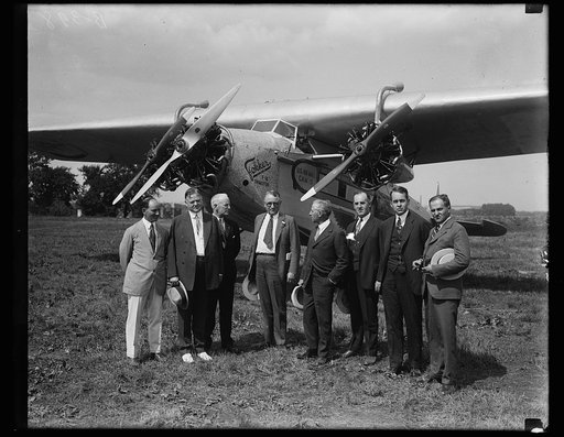 Group at U.S. Air Mail airplane; Herbert Hoover, 2nd from left