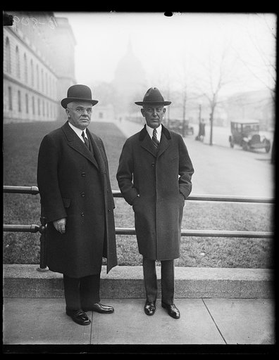 Men; U.S. Capitol in background. Washington, D.C.