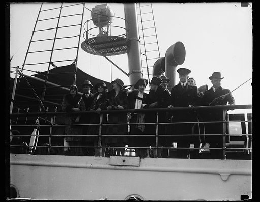 Grace Coolidge and Calvin Coolidge and group at ship rail