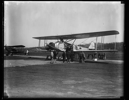 The "American Legion" biplane in which a New York to Paris flight will be attempted arrives in Washington. The "American Legion," the huge biplane in which Lieut. Commander Noel Davis of the United States Navy will attempt a New York to Paris flight was flown to Washington today whe [à] was inspecte