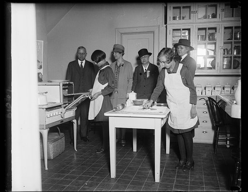 Wife of Secretary of Agriculture is guest of Girl Scouts at demonstration of home activities. Mrs. William M. Jardine, wife of the Secretary of Agriculture, was a guest of the Washington girl scouts at their Little Tea House today. This week being Better Homes Week, the scouts gave a demonstration o