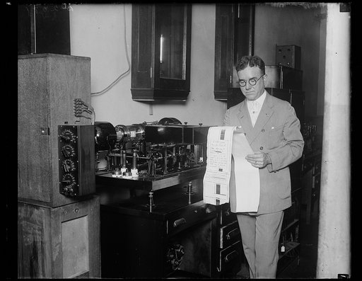 Flashing photos of letters by radio. Photographs of naval messages are now being sent by Radio instead of by dots and dashes of the Morse Telegraph code, from radio shore stations to ships. Using the new "RADIOPHOTOGRAM" machine the messages are sent in facsimile and no radio operator is necessary. 