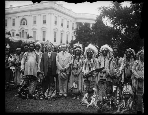 Calvin Coolidge with group of Native Americans outside White House, Washington, D.C.