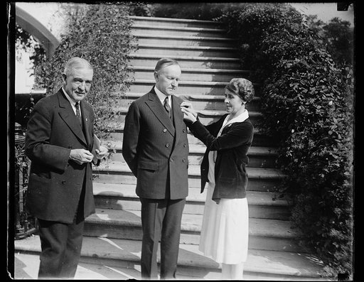 President and Mrs. Coolidge and unidentified outside White House, Washington, D.C.