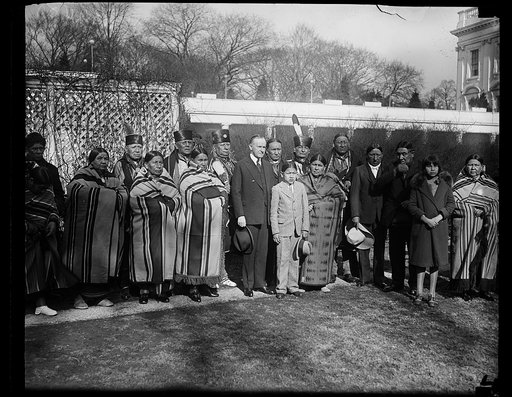Calvin Coolidge and group of Native Americans outside White House, Washington, D.C.