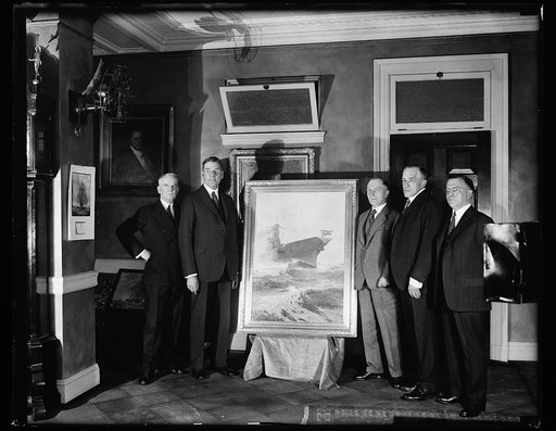 Group with painting of ship; Curtis Wilbur, second from left