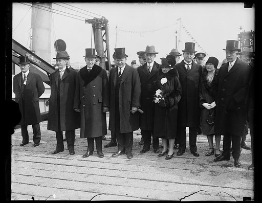 Claude Swanson, Calvin Coolidge and group at waterfront
