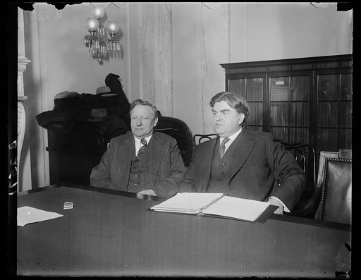 Head of United Mine Workers is first witness before Senate Coal Committee. John L. Lewis, (right) head of the United Mine Workers of America, was the first witness to testify before the Senate committee investigating the coal situation in Washington today. On the left is Senator James Watson of Indi