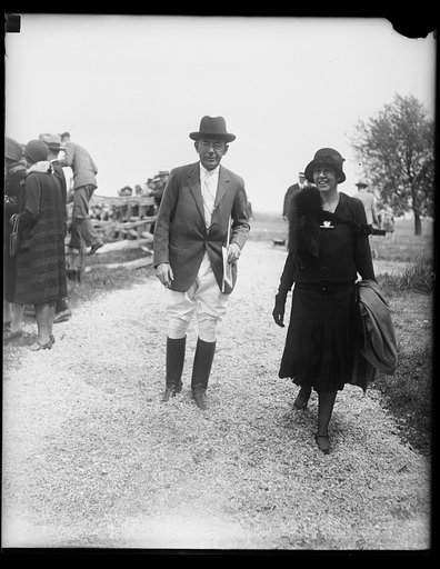 The Asst. Secy. of the Navy and Mrs. Theodore [Douglas?] Rotinson