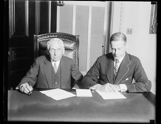 Frank Kellogg, left