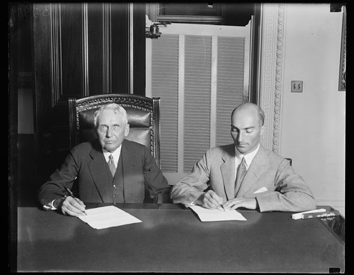 Frank Kellogg, left