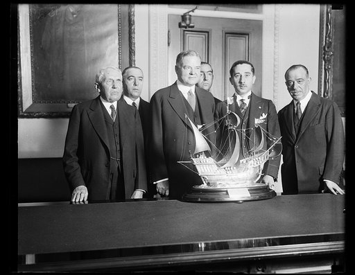 Group: Frank Kellogg, left, Herbert Hoover, center