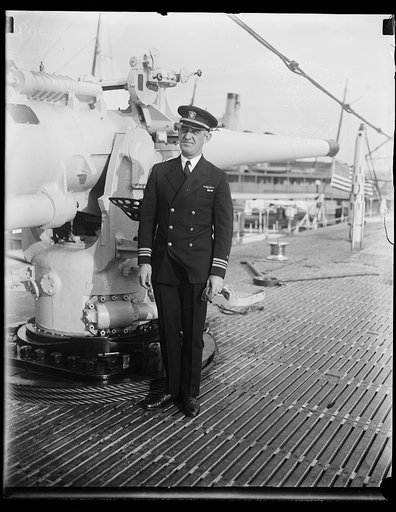 Lieut. Comdr. W.M. Quigley, who is in command of the V-4, the largest, latest and only mine-laying submarine of the United States Navy which docked at the Navy Yard in Washington, D.C., today