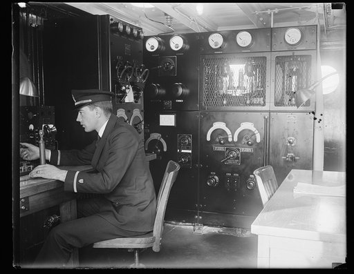 Biggest and costliest yet. This is the radio room on the U.S. Coast Guard Cutter Chelan, the newest cutter of the service now anchored at the Navy Yard, Washington D.C. This radio room houses three transmitters and three receiving sets. On the maiden trip she picked up an SOS and towed a schooner 1,